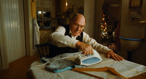 home-for-christmas_stills_old-man-ironing.jpg